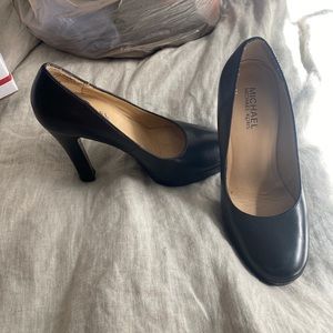 Michael kors black pumps size 4
